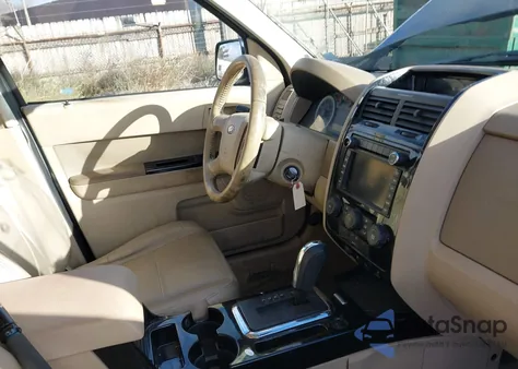 2009 Ford Escape Limited z USA, uszkodzony, nr VIN 1FMCU94G29KB26113